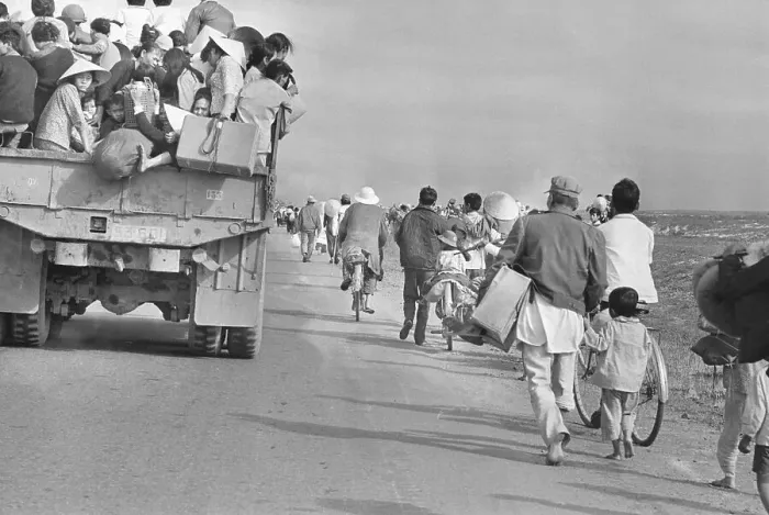 Framed Print : People Flee on Foot, Bike and Truck Framed Print : People Flee on Foot, Bike and Truck