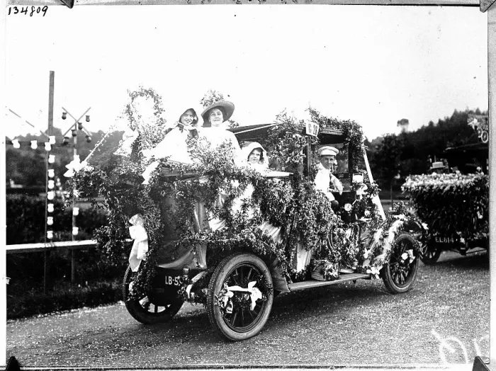 Framed Print : People in Flowered Vehicle at Easter Parade Framed Print : People in Flowered Vehicle at Easter Parade