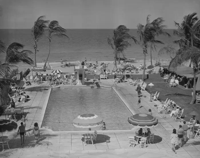 Framed Print : People at holiday resort by sea, elevated view