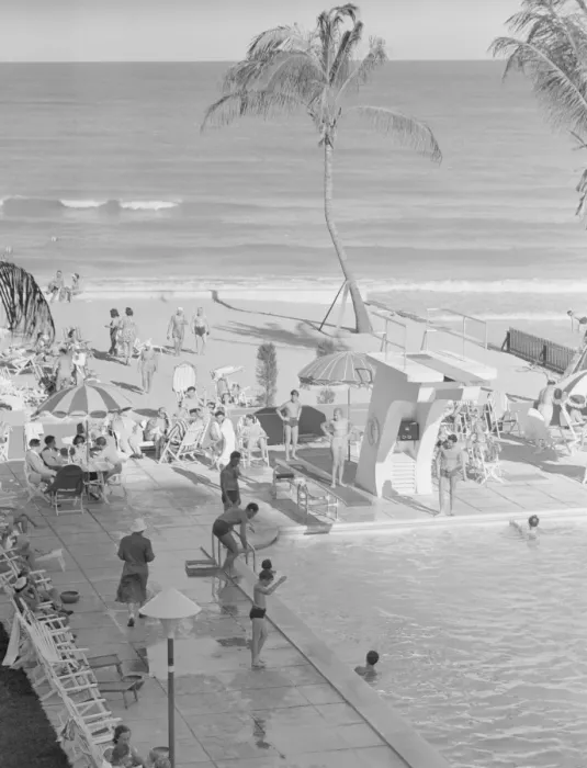 Framed Print : People at holiday resort by sea, elevated view Framed Print : People at holiday resort by sea, elevated view