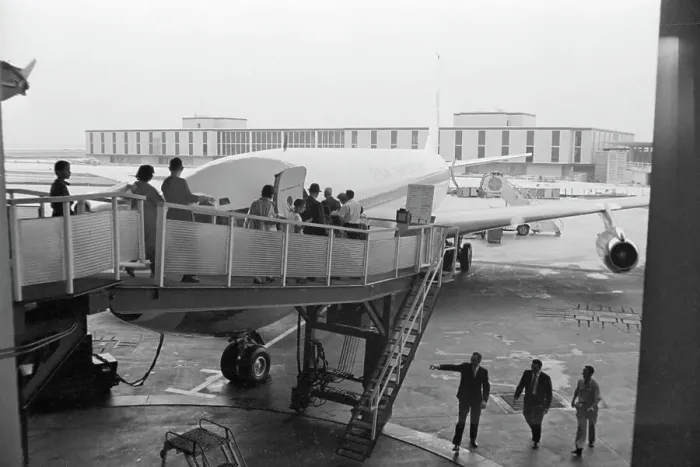 Framed Print : People Inspect Boeing Airplane Framed Print : People Inspect Boeing Airplane
