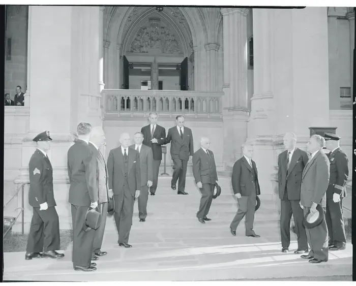 Framed Print : People Leaving a Funeral Service Framed Print : People Leaving a Funeral Service