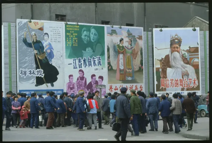 Framed Print : People Looking at Movie Posters Framed Print : People Looking at Movie Posters