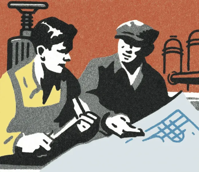 Framed Print : Two People Looking at a Plan Framed Print : Two People Looking at a Plan