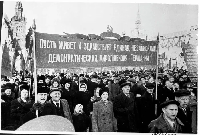 Framed Print : People Parade Through Red Square With Banner Framed Print : People Parade Through Red Square With Banner