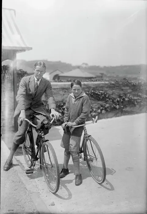 Framed Print : Two People Posing on Their Bicycles Framed Print : Two People Posing on Their Bicycles