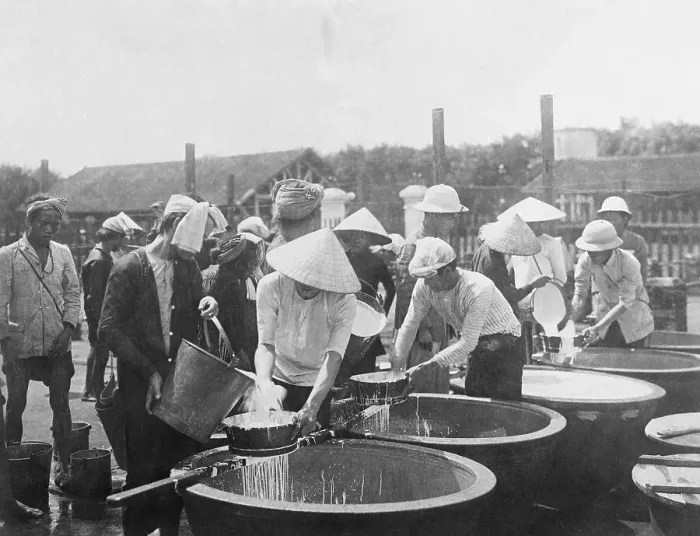 Framed Print : People Pouring Rubber Sap into Tanks Framed Print : People Pouring Rubber Sap into Tanks