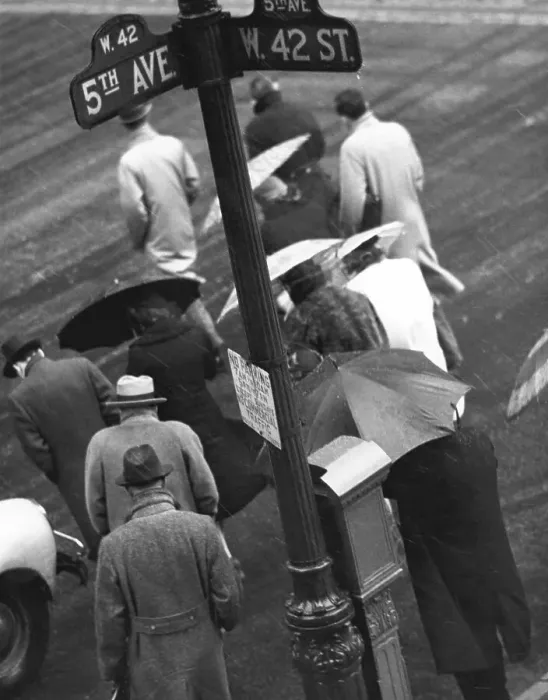 Framed Print : People in rain at corner of 5th Avenue and 42nd St Framed Print : People in rain at corner of 5th Avenue and 42nd St
