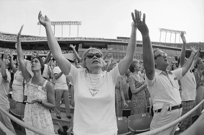 Framed Print : People Raising Arms at Religious Conference