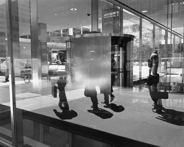People reflected in window, New York City
