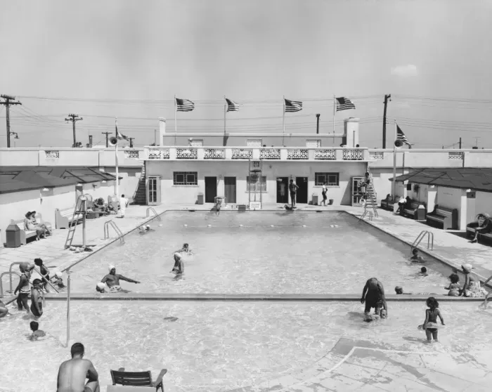 Framed Print : People relaxing in outdoor pool (B&W), elevated view Framed Print : People relaxing in outdoor pool (B&W), elevated view