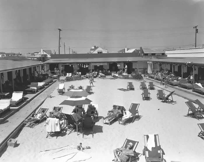 Framed Print : People relaxing by outdoors swimming pool, (B&W), elevated view Framed Print : People relaxing by outdoors swimming pool, (B&W), elevated view