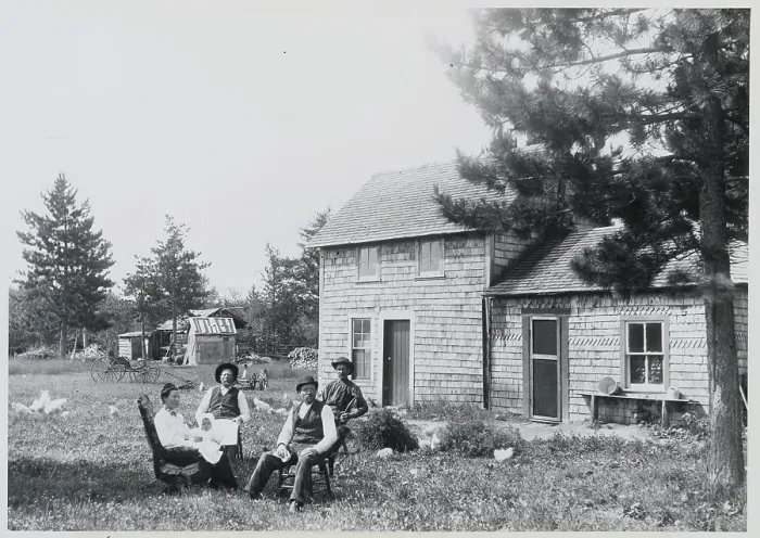 Framed Print : People Relaxing Outside Farm House Framed Print : People Relaxing Outside Farm House