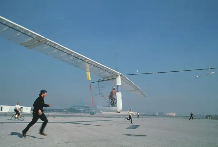 Framed Print : People Running Next to Aircraft Framed Print : People Running Next to Aircraft