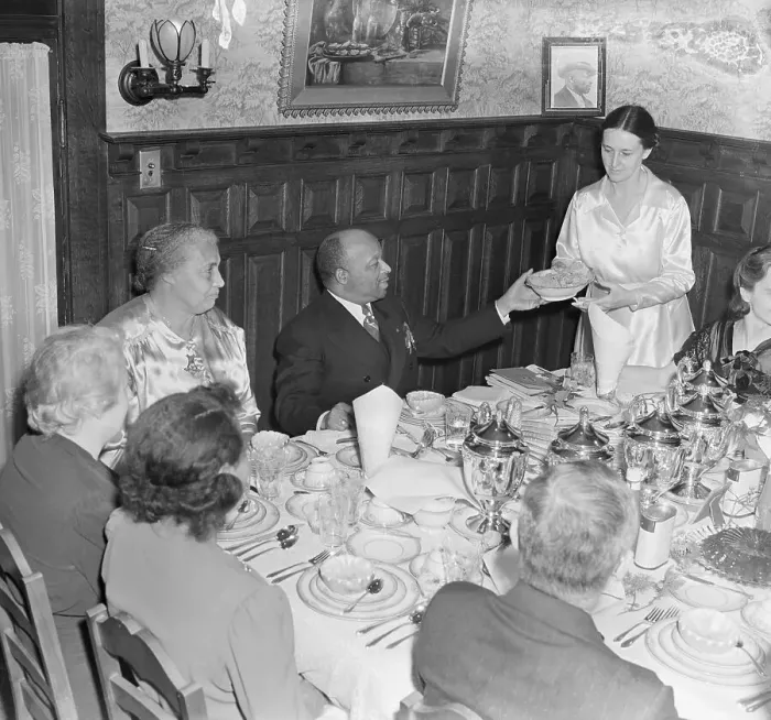 Framed Print : People Seated at Dining Table Framed Print : People Seated at Dining Table