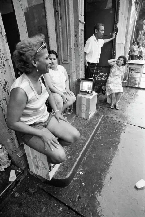 Framed Print : People Seated Outside Watching Tv Framed Print : People Seated Outside Watching Tv