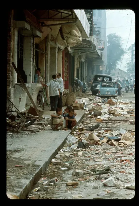 Framed Print : People Sifting Through Rubble in Street
