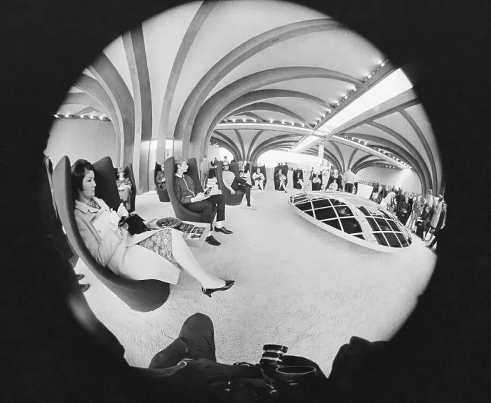 Framed Print : People Sitting in Talking Chairs at Expo 67