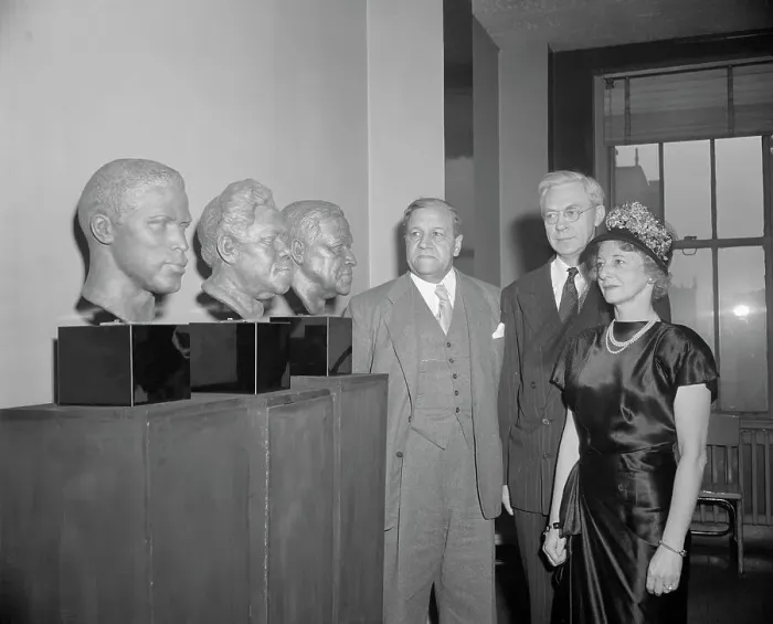 Framed Print : People Stand Next to Busts Framed Print : People Stand Next to Busts