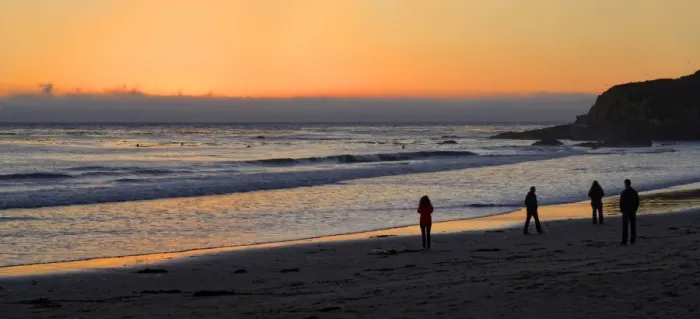 Framed Print : People at sunset at the Pacific beach of Cambria, California, United States Framed Print : People at sunset at the Pacific beach of Cambria, California, United States