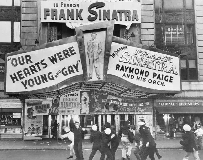 Framed Print : People Throwing Tomatoes at a Theater Framed Print : People Throwing Tomatoes at a Theater