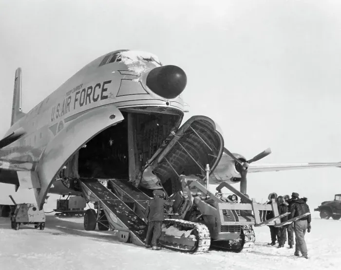 Framed Print : People Unloading Cargo From a Transport Plane Framed Print : People Unloading Cargo From a Transport Plane