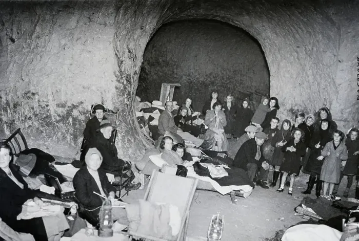 Framed Print : People Use Caves For Air Raid Shelter Framed Print : People Use Caves For Air Raid Shelter