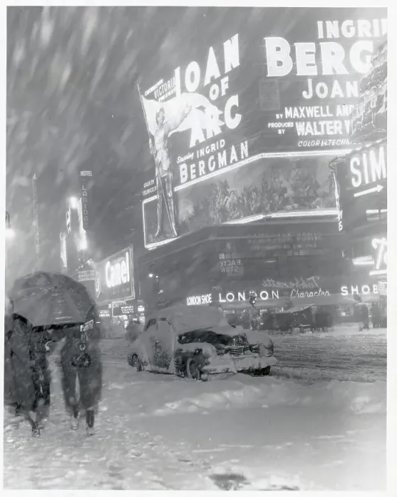 Framed Print : People Walking on City Street During Snowstorm Framed Print : People Walking on City Street During Snowstorm
