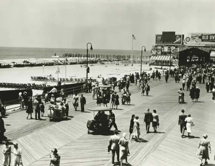 Framed Print : People walking on promenade by seashore, (B&W), (Elevated view) Framed Print : People walking on promenade by seashore, (B&W), (Elevated view)