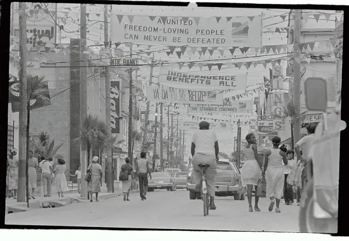 Framed Print : People Walking and Riding in Street of Belize Framed Print : People Walking and Riding in Street of Belize
