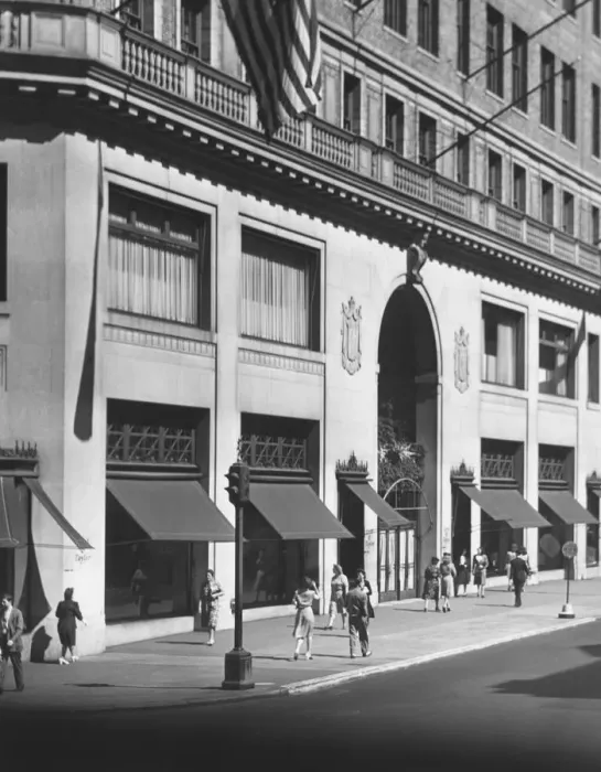 Framed Print : People walking on sidewalk along building (B&W) Framed Print : People walking on sidewalk along building (B&W)