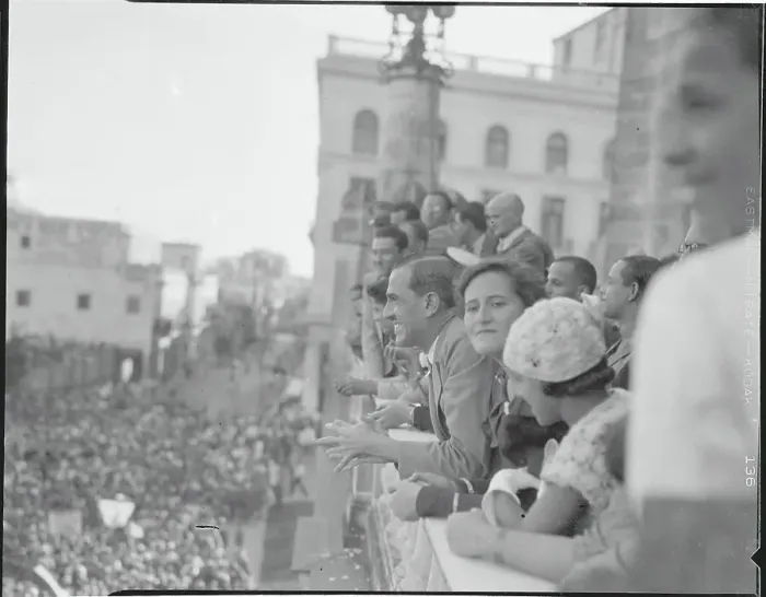 Framed Print : People Watching Parade from Balcony Framed Print : People Watching Parade from Balcony