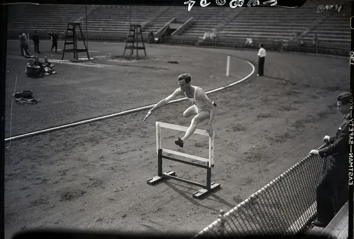 Framed Print : Percy Beard Jumping Over Hurdle