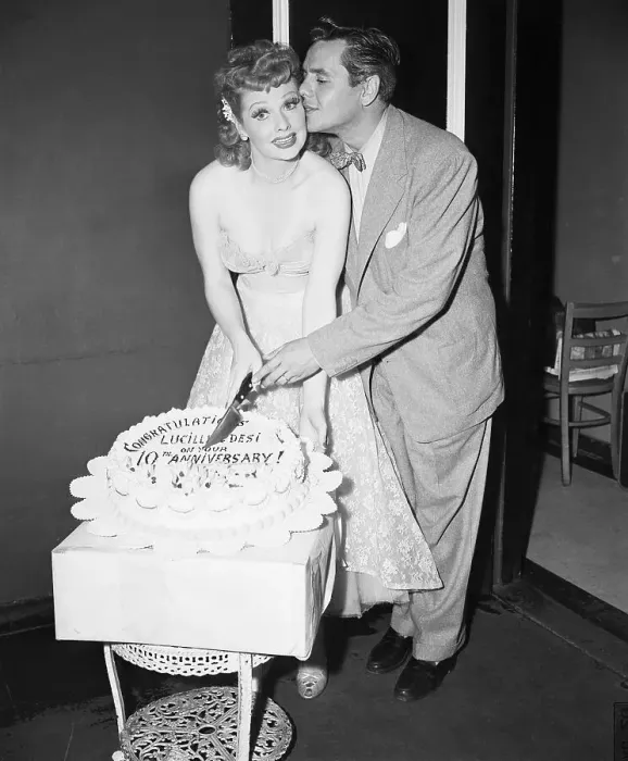 Framed Print : Performer Desi Arnaz Kissing Lucille Ball as They Prepare to Cut Cake Framed Print : Performer Desi Arnaz Kissing Lucille Ball as They Prepare to Cut Cake