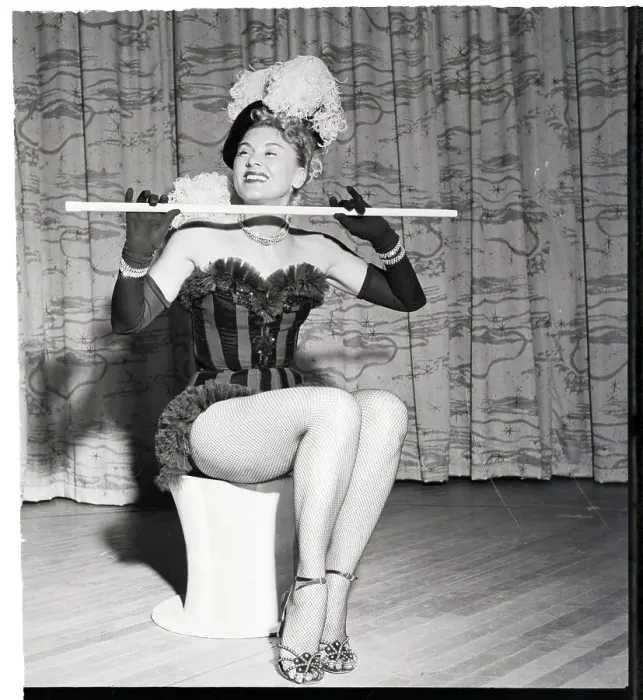 Framed Print : Performer Seated With Baton, In Bustier Framed Print : Performer Seated With Baton, In Bustier