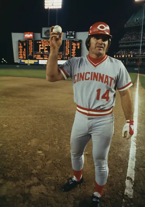 Framed Print : Pete Rose of the Cincinnati Reds holds up a baseball following his record-breaking Framed Print : Pete Rose of the Cincinnati Reds holds up a baseball following his record-breaking