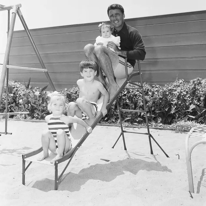 Framed Print : Peter Lawford with Children on Slide Framed Print : Peter Lawford with Children on Slide