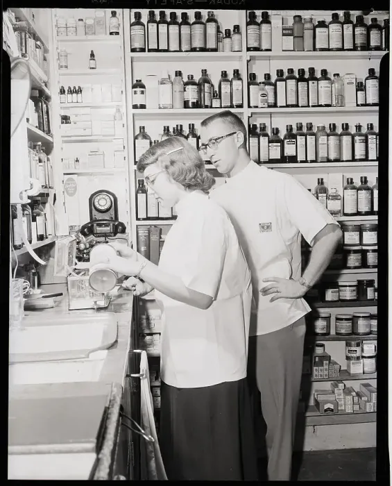 Framed Print : Pharmacist and Assistant Framed Print : Pharmacist and Assistant