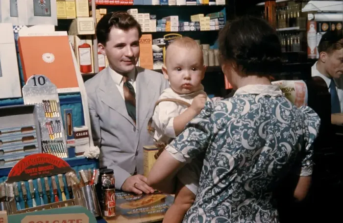 Framed Print : Pharmacy. NEW YORK - SEPTEMBER 1941: A Pharmacist serves customers in September Framed Print : Pharmacy. NEW YORK - SEPTEMBER 1941: A Pharmacist serves customers in September