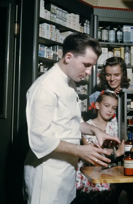Framed Print : Pharmacy. NEW YORK - SEPTEMBER 1941: A Pharmacist prepares a prescription Framed Print : Pharmacy. NEW YORK - SEPTEMBER 1941: A Pharmacist prepares a prescription