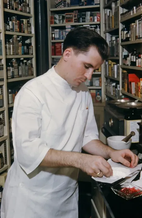 Framed Print : Pharmacy. NEW YORK - SEPTEMBER 1941: A Pharmacist prepares a prescription Framed Print : Pharmacy. NEW YORK - SEPTEMBER 1941: A Pharmacist prepares a prescription