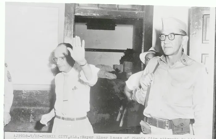 Framed Print : Phenix City, AL Mayor Elmer Reese Shielding His Face from Camera Framed Print : Phenix City, AL Mayor Elmer Reese Shielding His Face from Camera