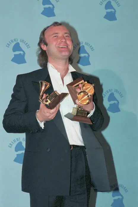 Framed Print : Phil Collins Showing Off Grammy Awards Framed Print : Phil Collins Showing Off Grammy Awards