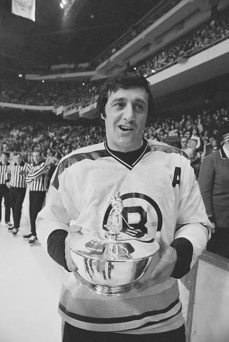 Framed Print : Phil Esposito Holding Trophy