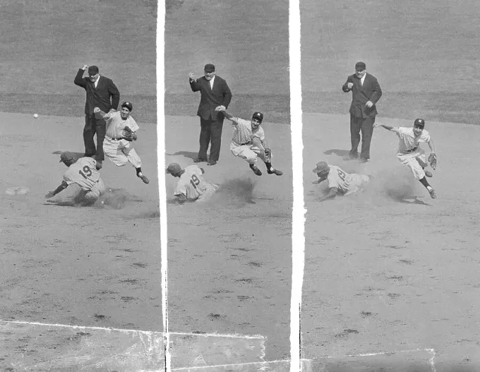 Framed Print : Phil Rizzuto Leaping over Jim Gilliam