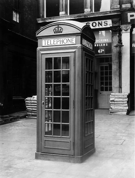 Phone Box. 15th March 1928: A telephone box outside 67A Farringdon Street, London