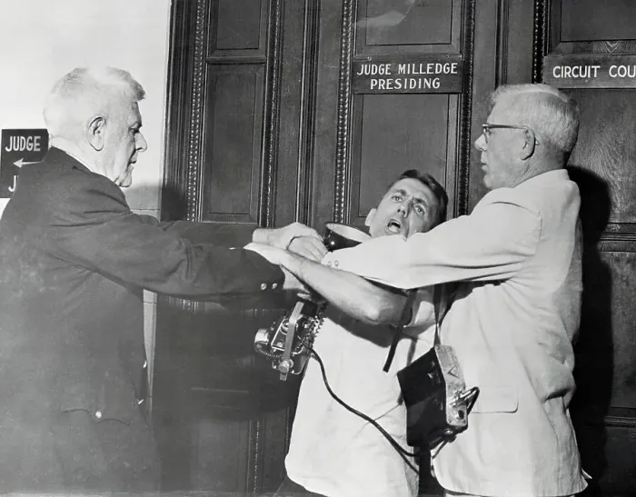 Framed Print : Photographer Accosted in Courtroom for Unwanted Attention Framed Print : Photographer Accosted in Courtroom for Unwanted Attention