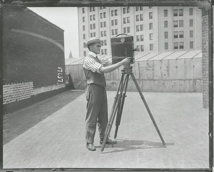 Framed Print : Photographer with Camera Framed Print : Photographer with Camera