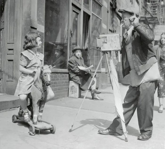 Framed Print : Photographer is taking picture of girl (6-7) sitting on toy horse Framed Print : Photographer is taking picture of girl (6-7) sitting on toy horse
