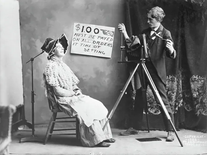 Framed Print : Photographer Taking Woman's Picture
